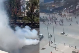A file photo of police officers lobbing tear gas at business owners in Nairobi CBD.